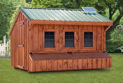 Super Coop with stained pine siding, metal roof, solar package