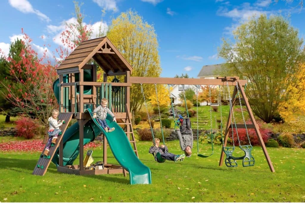 children playing on large playset