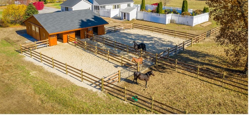 horse barn with pasture